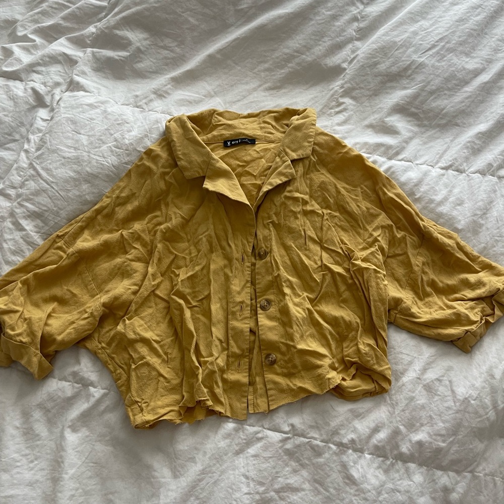 Yellow crop top raw hem edge